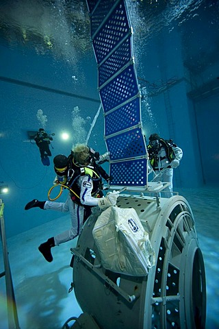 Backup divers and astronauts practicing with a space station module reproduction in a diving basin, European Space Agency, ESA, European Astronaut Center, EAC, Cologne, North Rhine-Westphalia, Germany, Europe