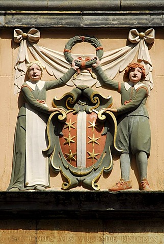 Relief of two orphans at the entrance of the library, a former orphanage, Gouda, Zuid-Holland, South Holland, The Netherlands, Europe