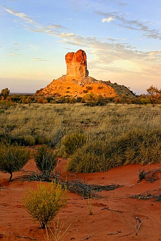 Historical pioneer landmark Chambers Pillar, 50 m high sandstone column in the red outback Australian landscape, Northern Territory, Australia