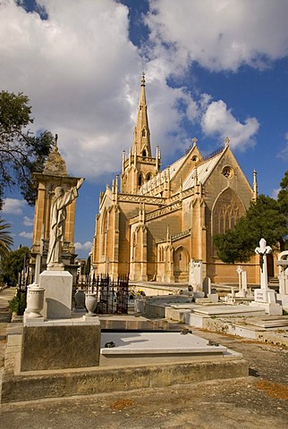 Clouds over the graves and church of Addolorata Cemetery, Malta, Europe