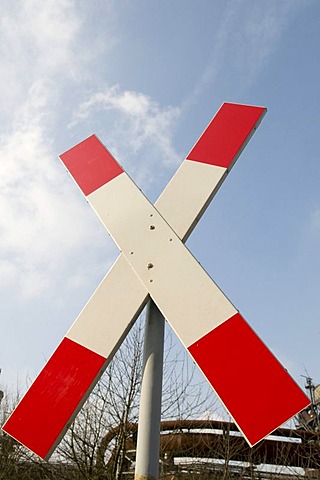 Crossing sign, saltire, at a level crossing, Landschaftspark Duisburg Nord landscape park, Ruhrgebiet area, North Rhine-Westphalia, Germany, Europe