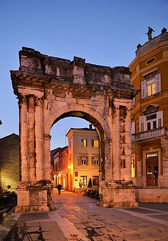 Triumphal Arch of the Sergii at night in Pula, Croatia, Europe