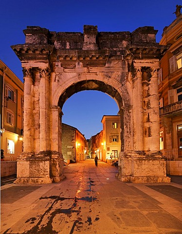 Triumphal Arch of the Sergii at night in Pula, Croatia, Europe