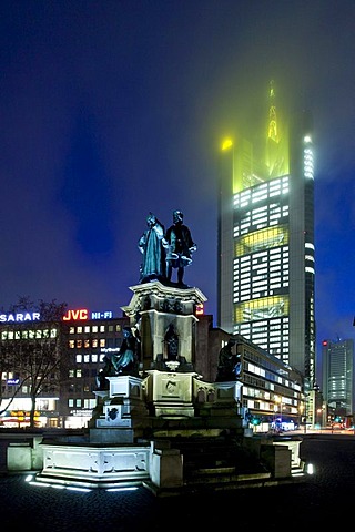 Johannes Gutenberg monument on the Rossmarkt, the headquarters of the Commerzbank behind, with the top of the building in clouds, Frankfurt, Hesse, Germany, Europe