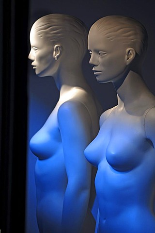 Two white nude mannequins illuminated in blue, Freiburg, Germany, Europe