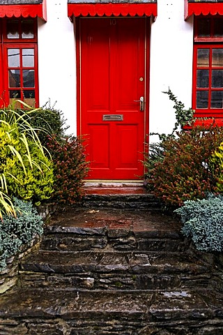 Stone stairs, red door, Kenmare, Ireland, Europe