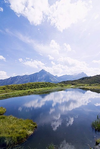 Mountain lake in the canton of Grisons, Switzerland, Europe