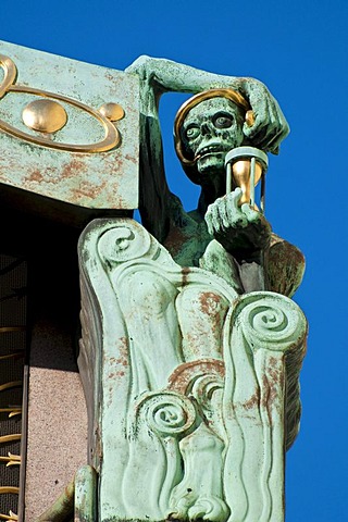 Death with hourglass, detail of Anker clock, art nouveau, Vienna, Austria, Europe