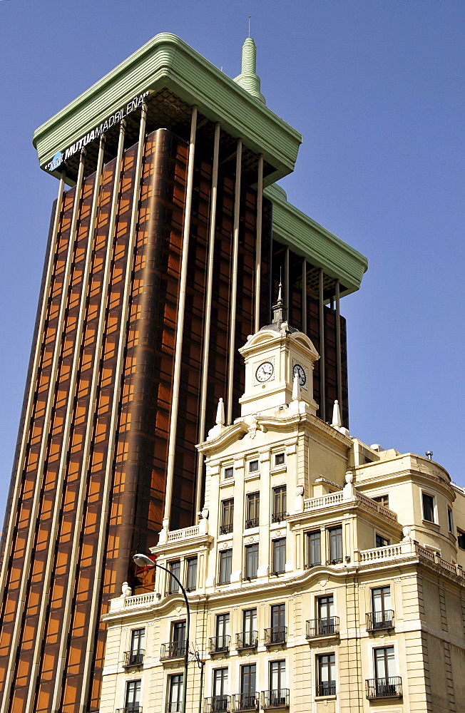 Old clock tower in front of the Torres de Colon building on the Plaza de Colon, Madrid, Spain, Iberian Peninsula, Europe