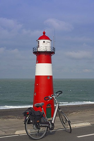 Lighthouse and a bicycle, Westkapelle, Zeeland, Holland, Netherlands, Europe