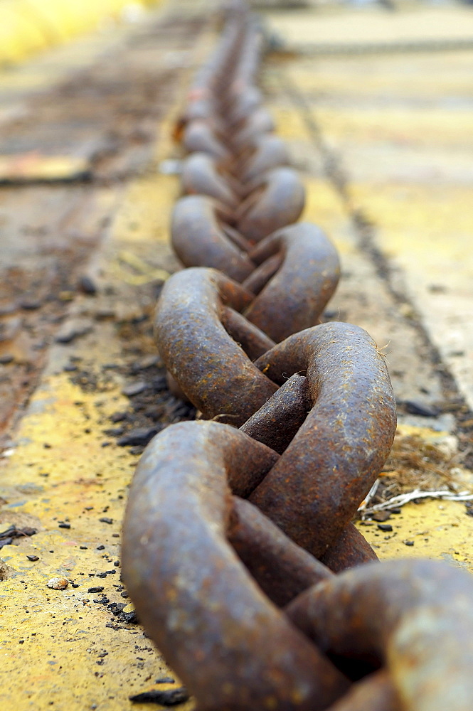 Thick iron chain lies on the ground, port, Cagliari, Sardinia, Italy, Europe