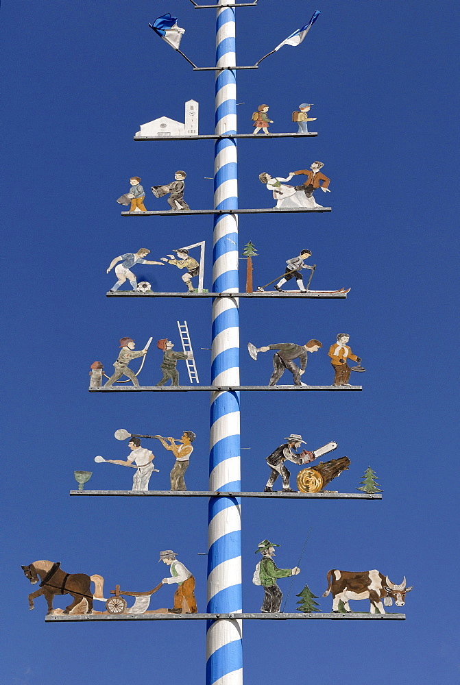 Maypole with representations of work and leisure, Lindberg near Zwiesel, Bavarian Forest, Lower Bavaria, Bavaria, Germany, Europe