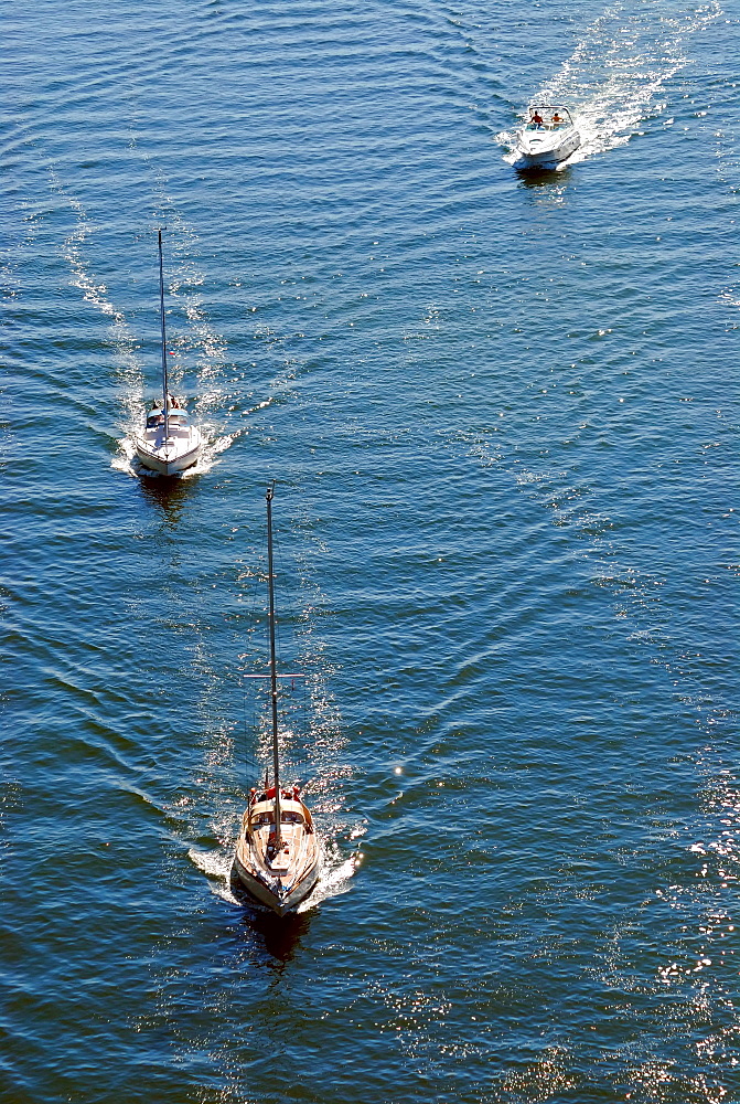 Sailboats and motor boats on the Nord-Ostsee-Kanal, Kiel Canal, Kiel, Schleswig-Holstein, Germany, Europe