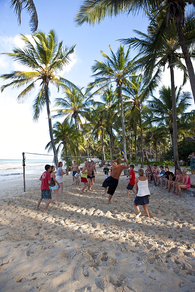 Young people playing beach volleyball, Kaarafu Beach, Zanzibar, Tanzania, Africa