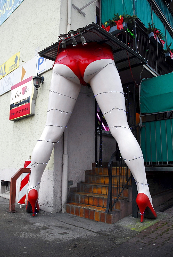 Oversized sexy legs at the entrance to the Amor Eroscenter, Frankfurt am Main, Hesse, Germany, Europe