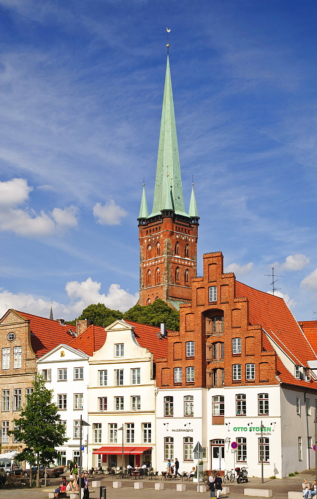 Classical town mansions with typical gables at the upper Trave river, in the back the church of St. Petri, Luebeck, Schleswig-Holstein, Germany, Europe