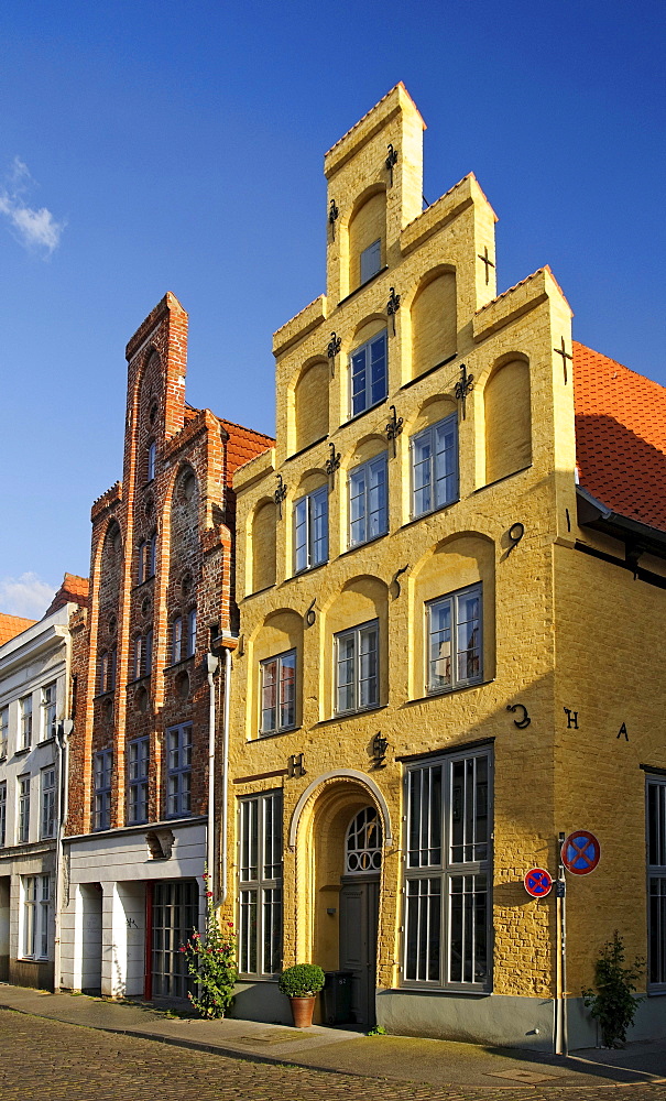 Historical residential houses with typical stepped gables in the historic center of Luebeck, Schleswig-Holstein, Germany, Europe