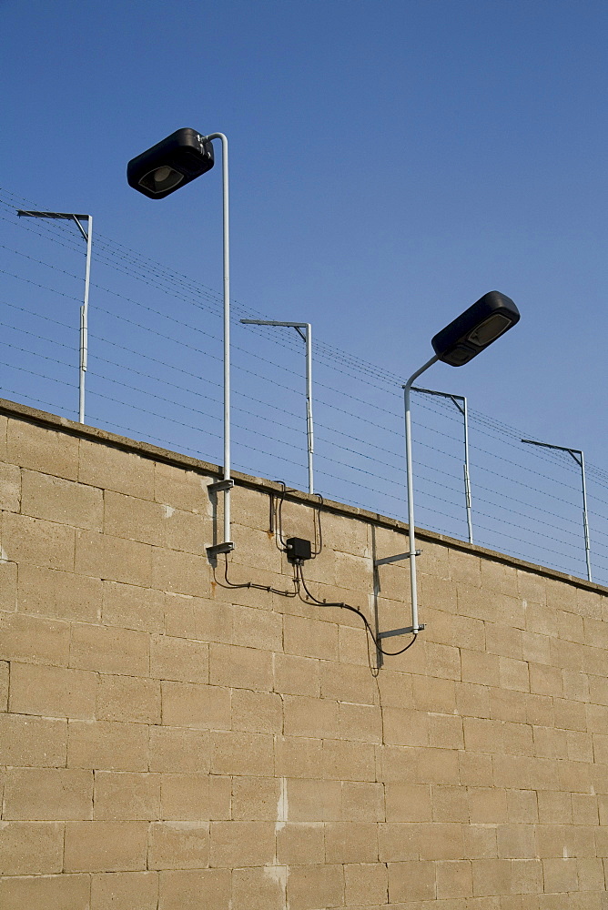 Observation tower and prison wall with barbed wire, Berlin-Hohenschoenhausen memorial, former prison of the German Democratic Republic's secret service, Berlin, Germany, Europe