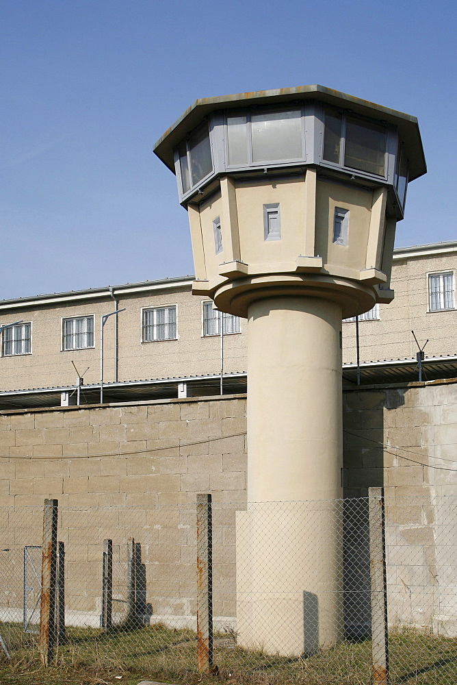 Observation tower and prison wall with barbed wire, Berlin-Hohenschoenhausen memorial, former prison of the German Democratic Republic's secret service, Berlin, Germany, Europe