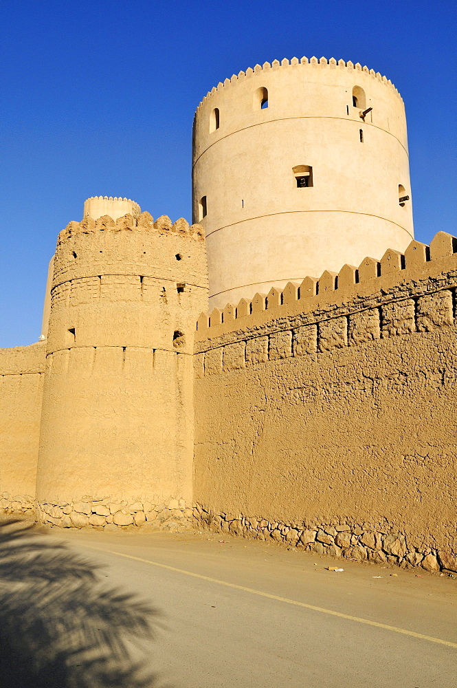 Historic adobe fortification Rustaq Fort or Castle, Hajar al Gharbi Mountains, Batinah Region, Sultanate of Oman, Arabia, Middle East