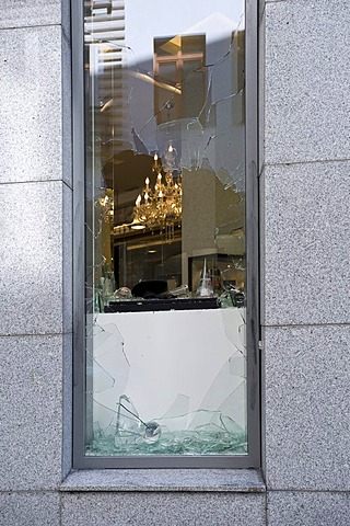 Break-in, broken display window of a jeweller's shop