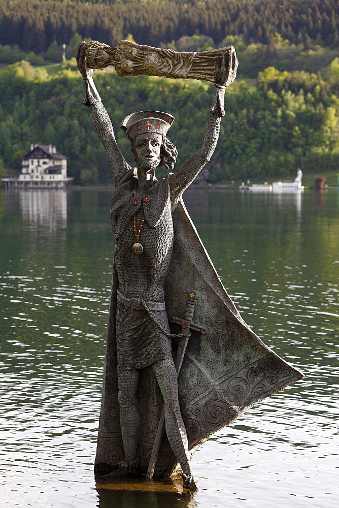 Statue of St. Domitian, created in 1994 by Prof. Giorgio Igne, Millstaetter See, Millstatt Lake, Millstatt, Carinthia, Austria, Europe