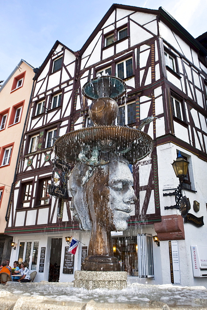 Fountain sculpture at a historic place in the Hebegasse, Bernkastel-Kues, Mosel river, Rhineland-Palatinate, Germany, Europe