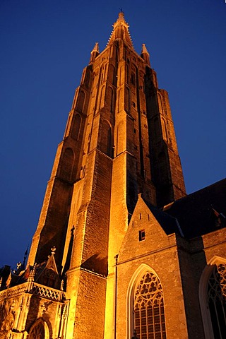 Illuminated tower of the Church of Our Lady, Bruges, Belgium, Europe