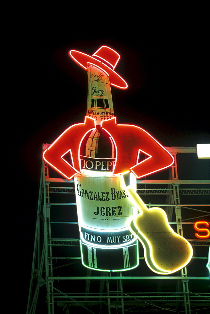 Tio Pepe, neon sign on the central square of Plaza Puerta del Sol at Night, Madrid, Spain, Europe