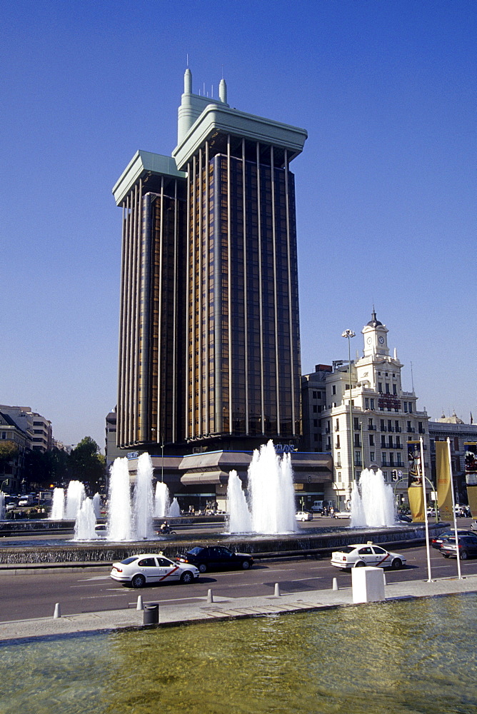 Twin towers, Torres de Colon, transport hub with a fountain at Plaza de Colon, Madrid, Spain, Europe