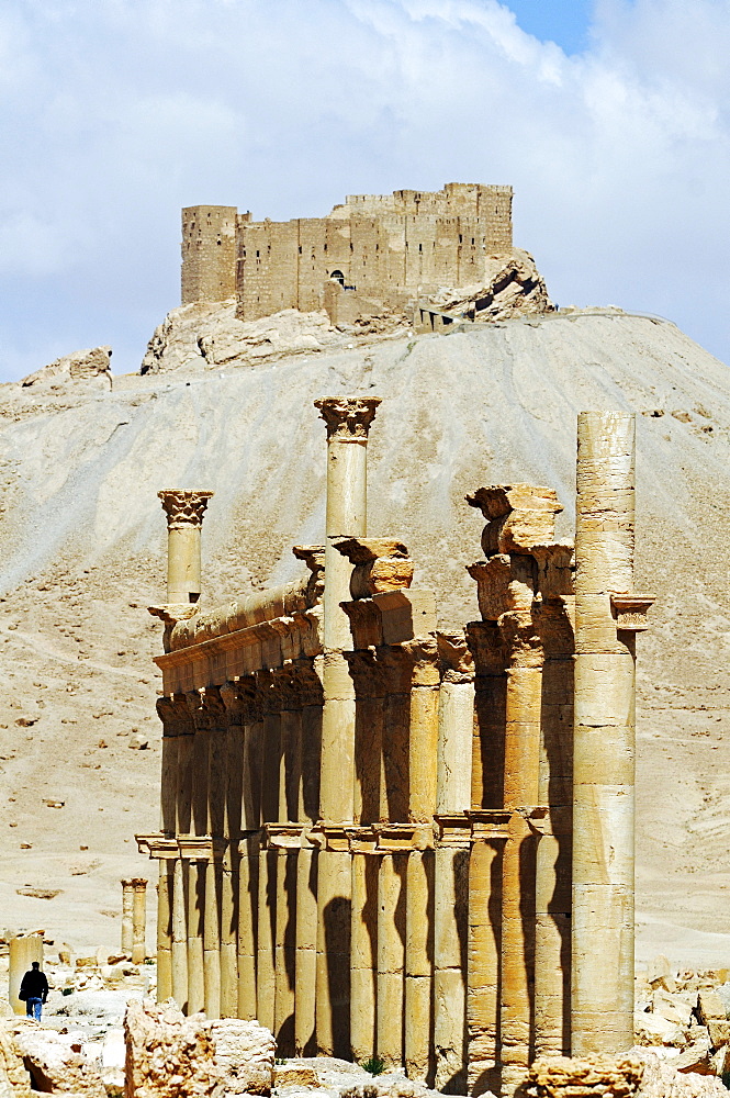 Ruins in the Palmyra archeological site, in the back castle Qala'at Ibn Ma'n, Tadmur, Syria, Asia