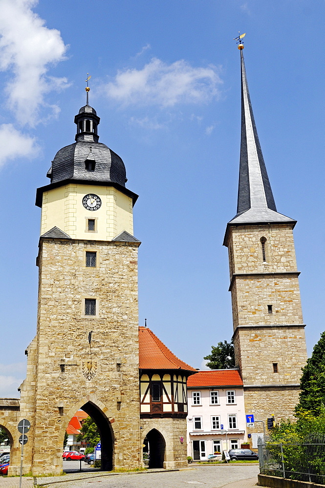 Historic city gate next to Riedturm Tower and the tower of St Jakobus pilgrimage church, Riedplatz Square, Arnstadt, Thuringia, Germany, Europe