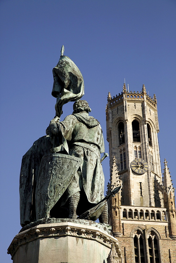 Statue of the Bruges folk heroes Jan Breydel and Pieter de Coninck, on the market square Grote Markt, in the historic centre of Bruges, Belgium, Europe