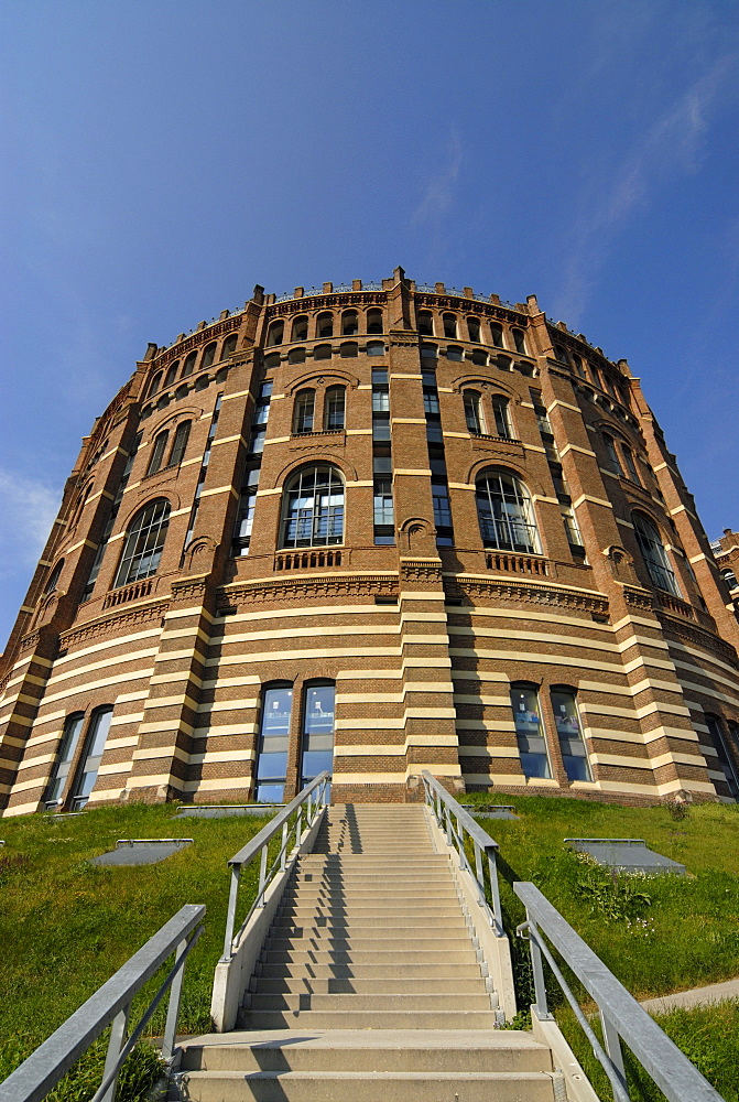 Front facade of the renovated historic Gasometer A in Simmering, Vienna, Austria, Europe