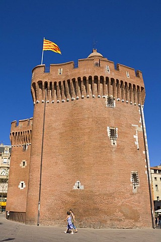 Catalan flag above the city gate "Le Castillet", Perpignan, Pyrenees-Orientales, Roussillon, Languedoc-Roussillon, South France, France