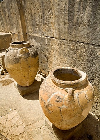 Large ancient pithoi, similar to amphoras, at the excavation site of the Minoan palaces of Festos, island of Crete, Greece, Europe