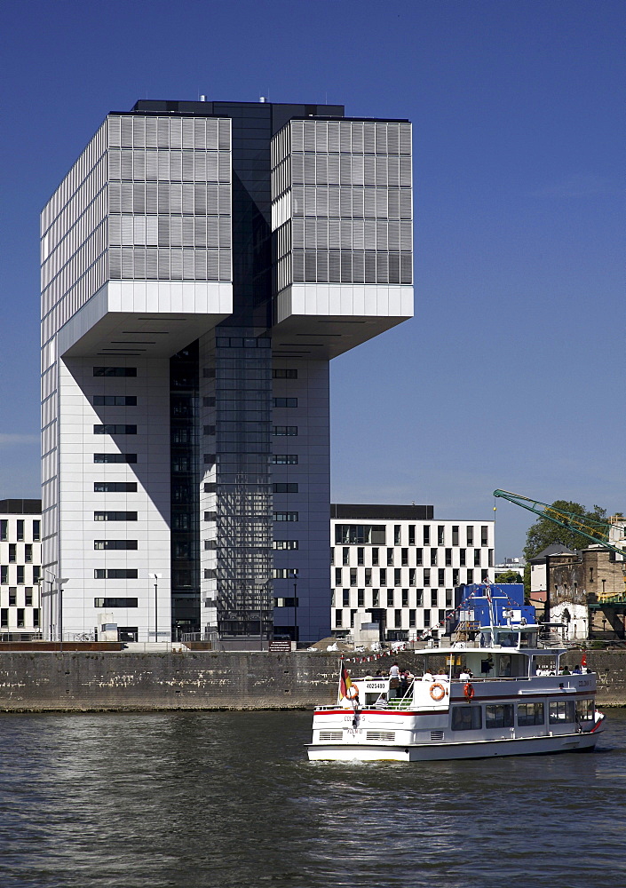 Excursion boat in front of a Kranhaus crane buildings at the Rheinauhafen harbour, Cologne, Rhineland, North Rhine-Westphalia, Germany, Europe