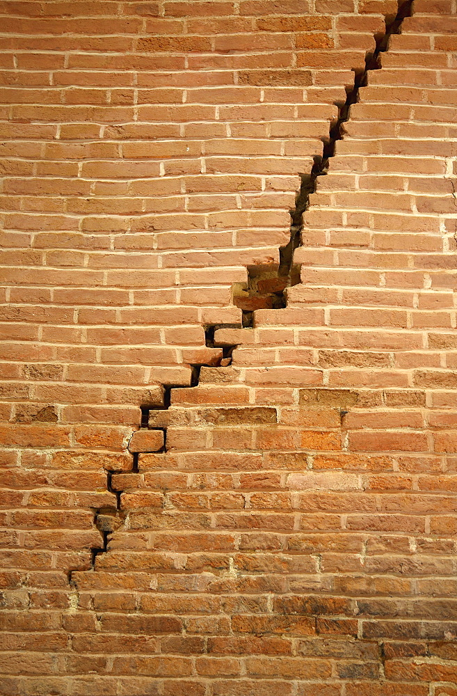 Crack in brick wall caused by earthquake