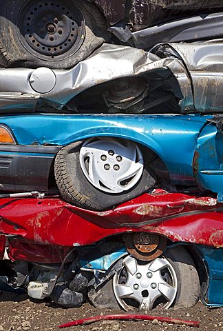 Junk cars crushed and ready for recycling at a scrap yard, Detroit, Michigan, USA