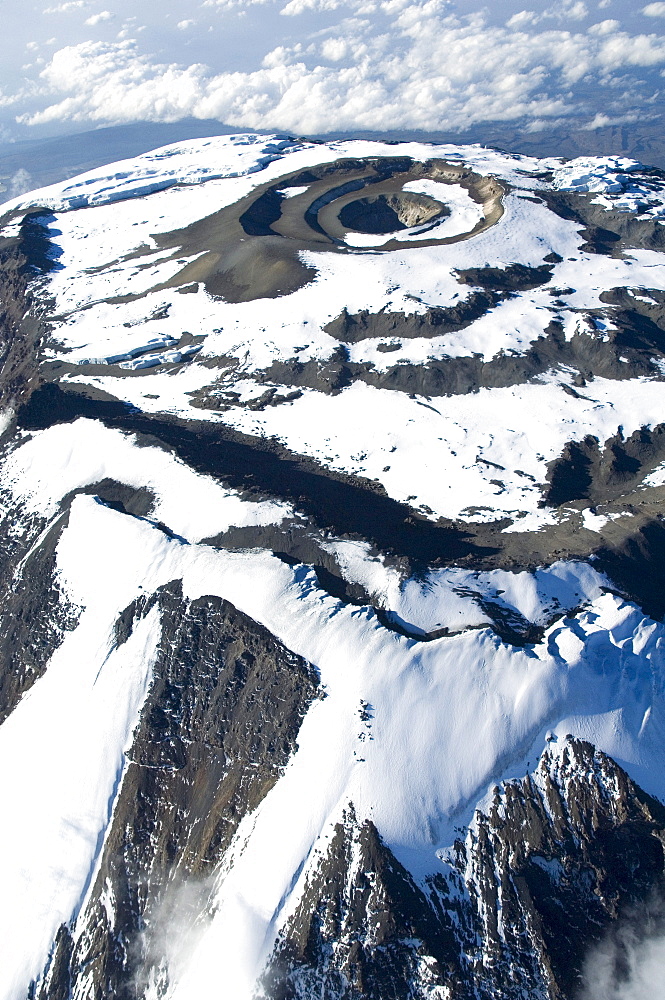 Aerial view of Mt. Kilimanjaro 19335 ft. or 5895 m, crater floor with ash cone and pit, Southern Ice field in the foreground, Tanzania, Africa