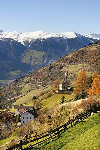 View from Tannas with the Sacred Heart Church across the Etsch valley to the mountains around Stelvio Pass, Passo dello Stelvio, Vinschgau, Val Venosta, Alto Adige, Italy, Europe