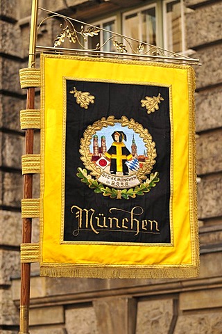 Munich's coat of arms displayed on a flag during the Oktoberfest's traditional costume procession, Munich, Bavaria, Germany, Europe