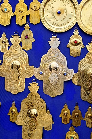 Hamsas or Hands of Fatima, good luck charms, in a souvenir shop at Place Djemma el-Fna, Square of the Hanged, Square of the Jesters, Marrakesh, Morocco, Africa