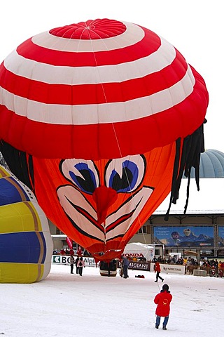 Inflation of a hot-ar balloon, special clown shape, Schroeder fire balloons Clown ss, hot-air balloon, International Balloon Festival, Chateau-d'Oex, Switzerland, Europe