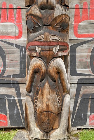 Totem pole outside a Native American long house, detail, K'san Historical Village Museum, Hazelton, British Columbia, Canada, North America