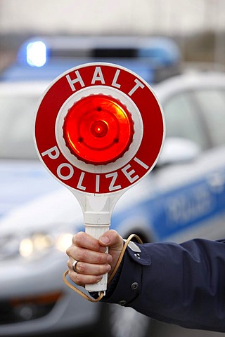 Police stop sign for stopping cars, Duesseldorf, North Rhine-Westphalia, Germany, Europe