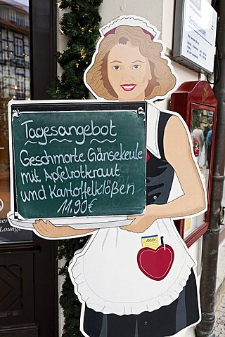 Cardboard waitress displaying the menu of the day, braised leg of goose, Wernigerode, Harz, Saxony-Anhalt, Germany, Europe