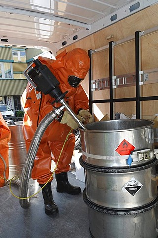 Hazardous material practice of the fire brigade wearing protective clothing