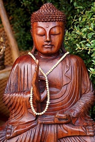 Buddha figure wearing a necklace at a garden exhibition, Wachenroth, Middle Franconia, Bavaria, Germany, Europe