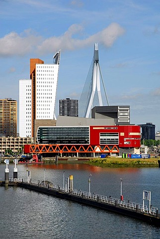 Modern architecture by the waterside: the red Luxor theatre, to the left of it the Belvedere building of the telephone company KPN Telecom and behind it the Erasmusbrug bridge, Wilhelminapier, Wilhelminaplein, Rijnhaven, Rotterdam, South Holland, the Neth